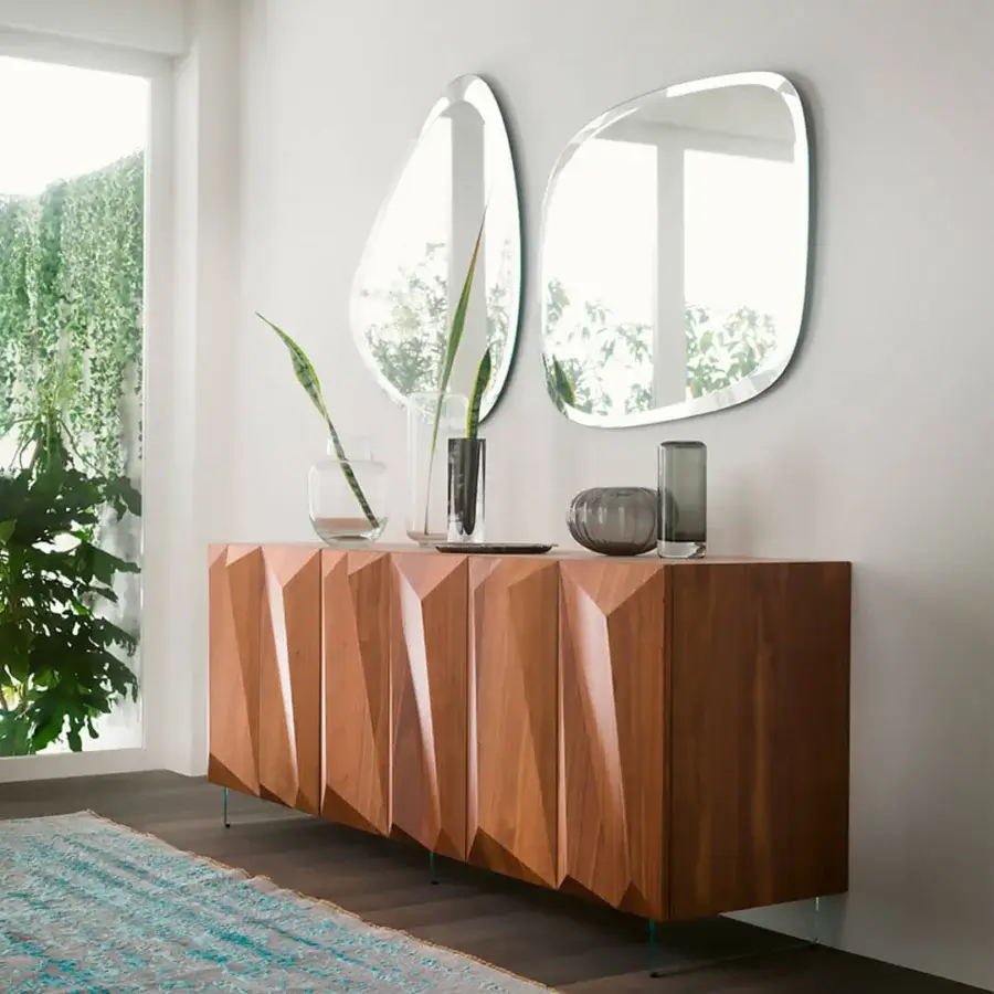 Superior Reflex Seventy mirror crafted from extra-clear glass with a bevelled edge and organically shaped silhouette