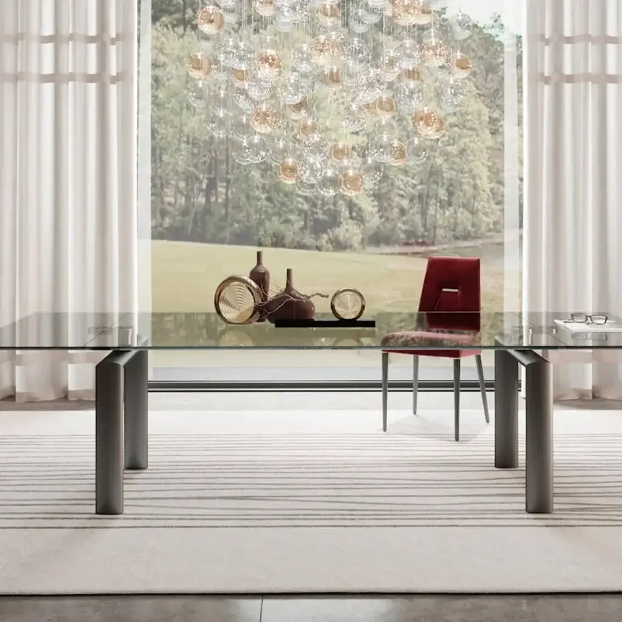 Distinctive Reflex Policleto Re-edition table with transparent tempered glass top and oval metal legs in matte finish