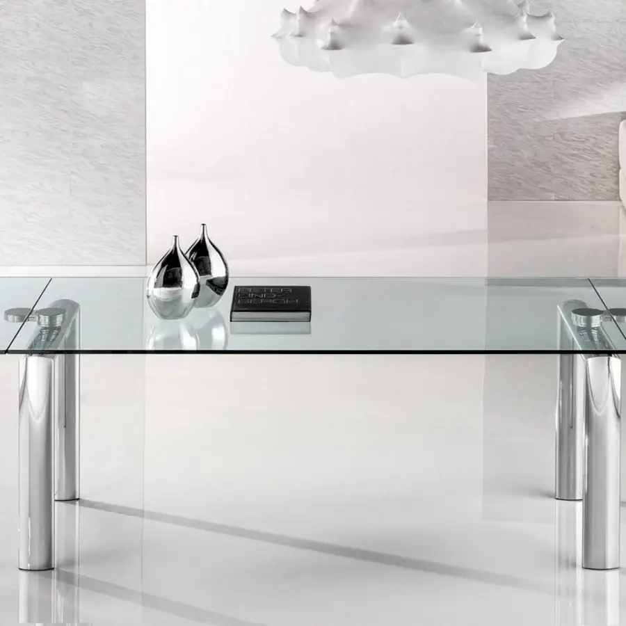 Elegant Reflex Policleto Re-edition table with transparent tempered glass top and polished metal oval legs