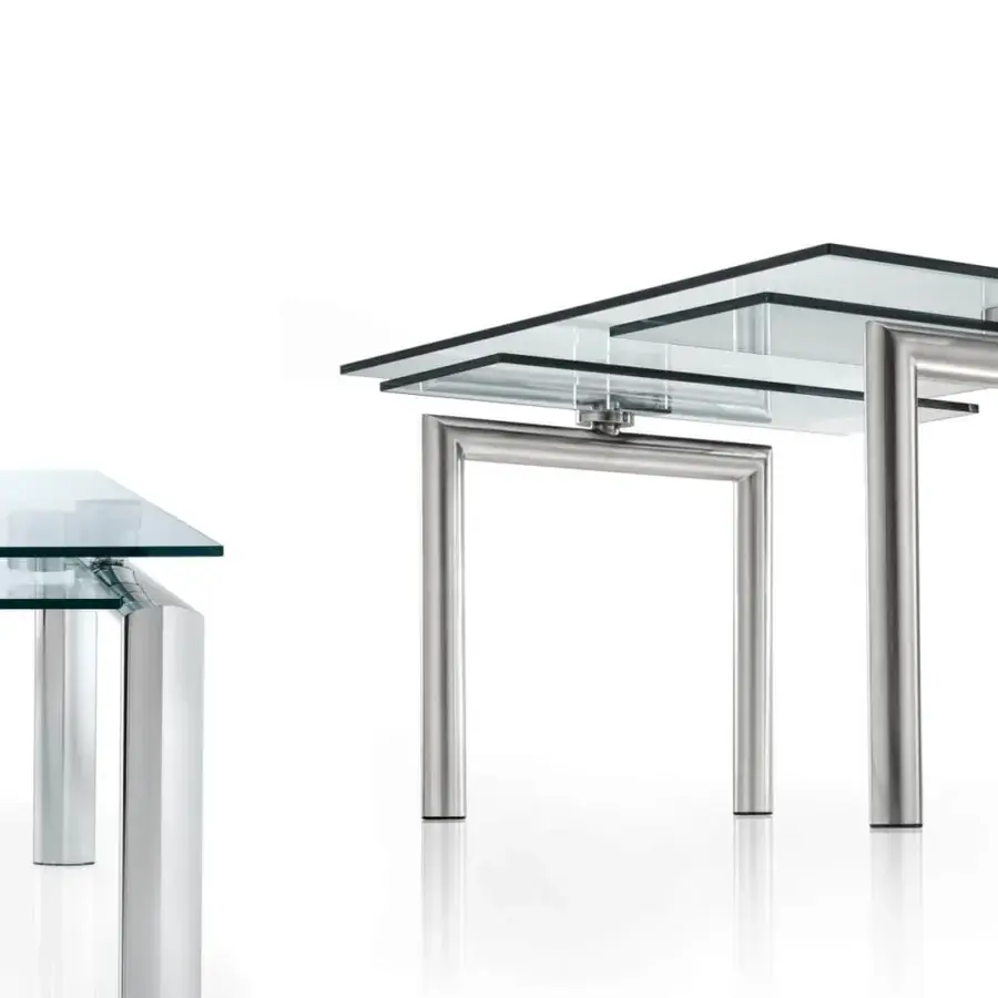 Elegant Reflex Policleto Re-edition table with transparent tempered glass top and silver-toned metal legs crafted in Italy