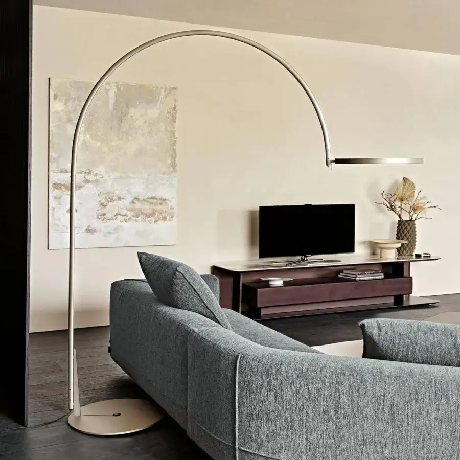 Exceptional Cattelan Italia Arx floor lamp with arched form crafted in embossed lacquered steel and smooth finish