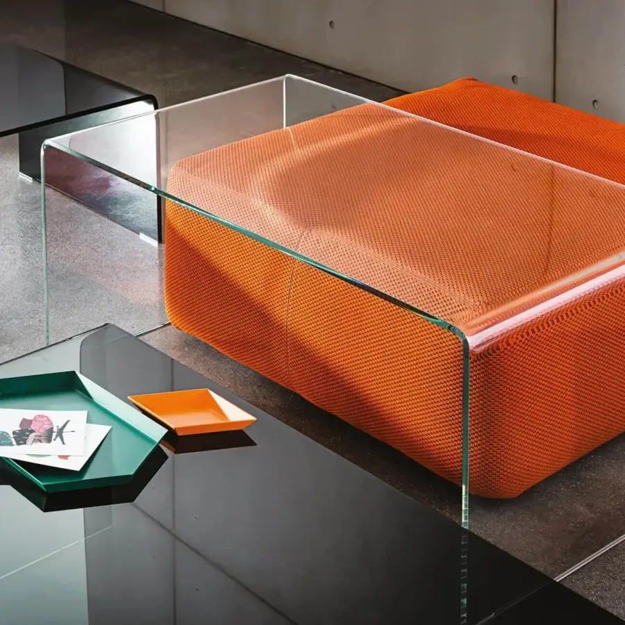 Superior Sovet Italia Bridge Square coffee table in bent smoked glass with vibrant orange textile cushion