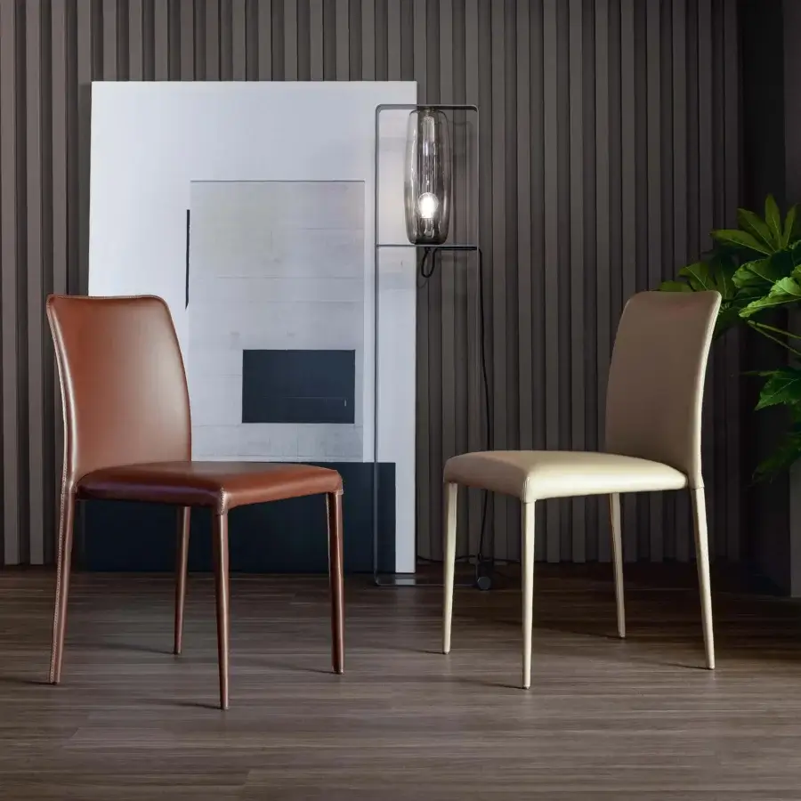 Superior Bonaldo Deli chair in supple brown leather with upholstered legs and fine stitching details