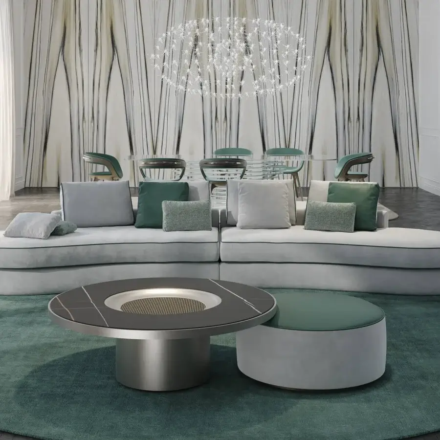 Distinguished Reflex Adone sectional upholstered in light gray textile with smooth finish and green trim outlining cushions and base