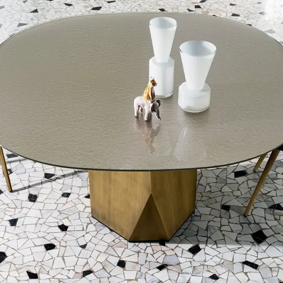 Exclusive Sovet Italia Deod round table with lacquered metal base and neutral grey liquid glass top presents a sophisticated hexagonal finish