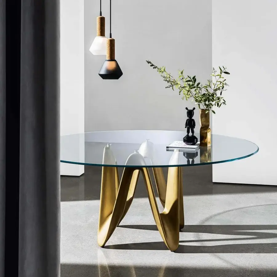 Captivating Sovet Italia Lambda table with clear tempered glass and burnished Cristalplant base