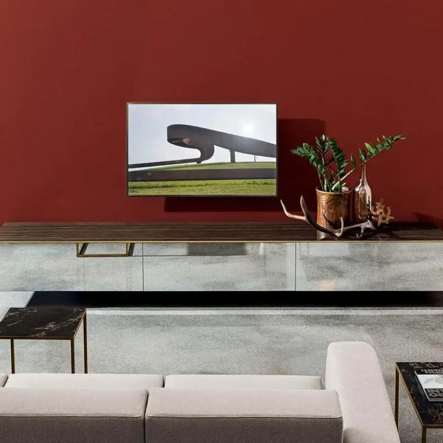 Exceptional Sovet Italia Magda suspended sideboard with light gray ceramic and brass profile accents built with a recessed base