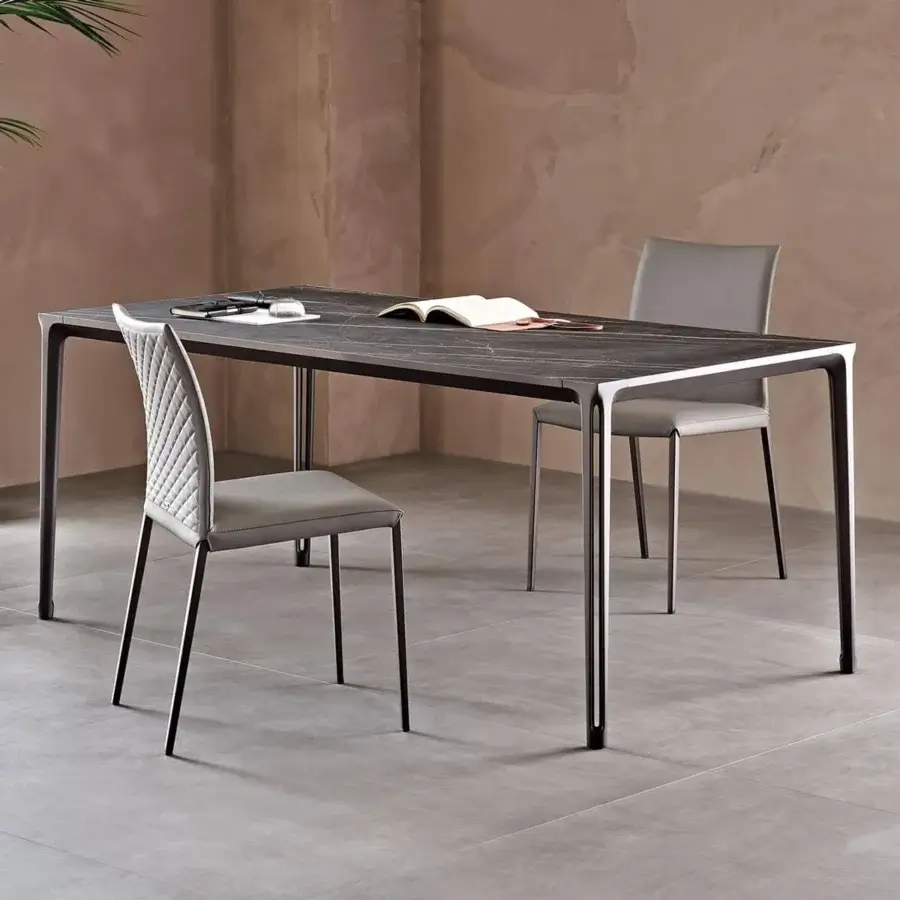 Elegant Cattelan Italia Boulevard Keramik table with dark ceramic Marmi top and embossed lacquered aluminum legs