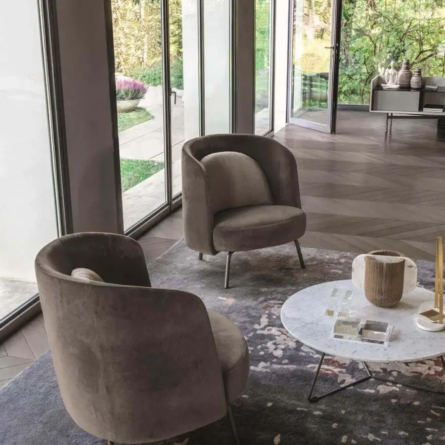 Distinguished Ditre Italia Lucia lounge chair with graceful curves and plush muted brown textile upholstery with matte finish
