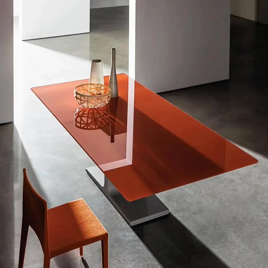 Superior Sovet Italia Palace table with glossy reddish-orange laminated ceramic and matte gray lacquered metal base