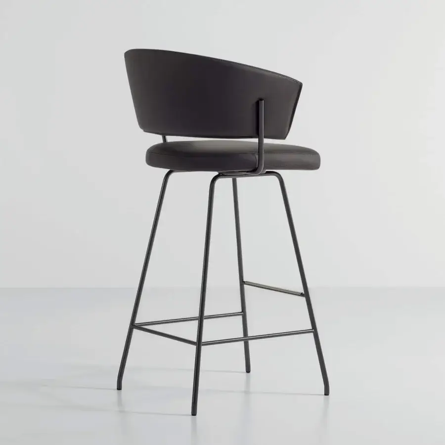 Sophisticated Bonaldo Bahia stool with padded seat and curved backrest in sleek black eco-leather with matte black steel structure