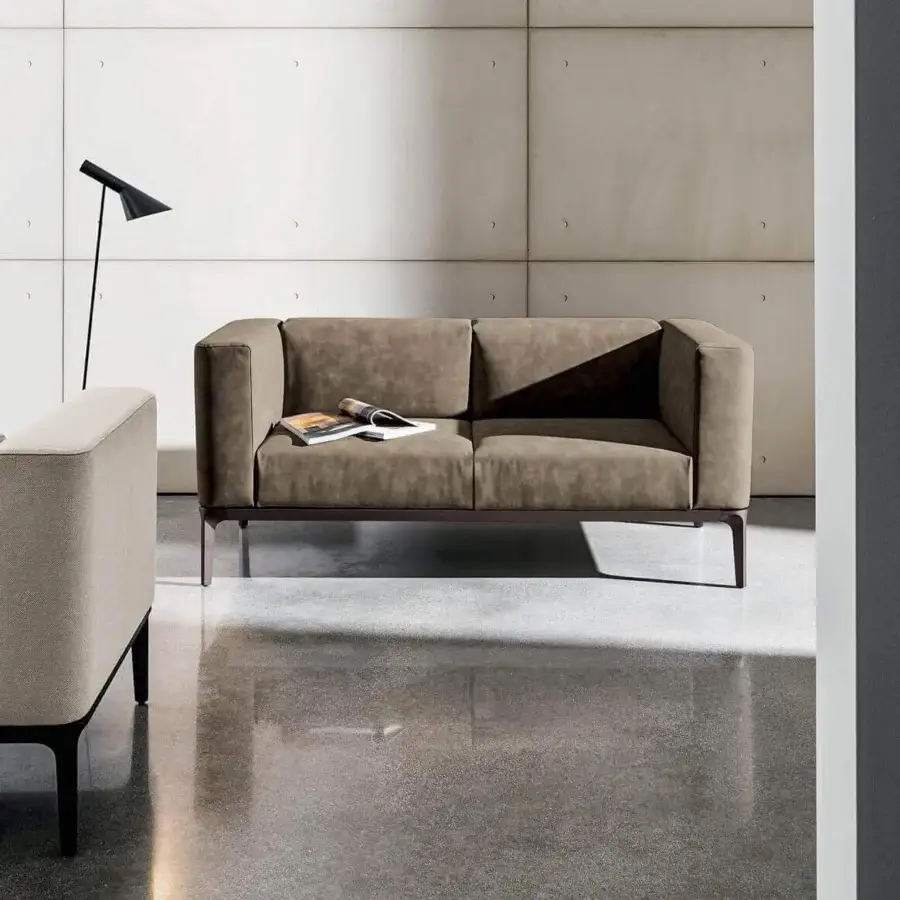 Distinguished Sovet Italia Slim sofa with geometric silhouette and smooth brown European textile upholstery with die-cast aluminum legs