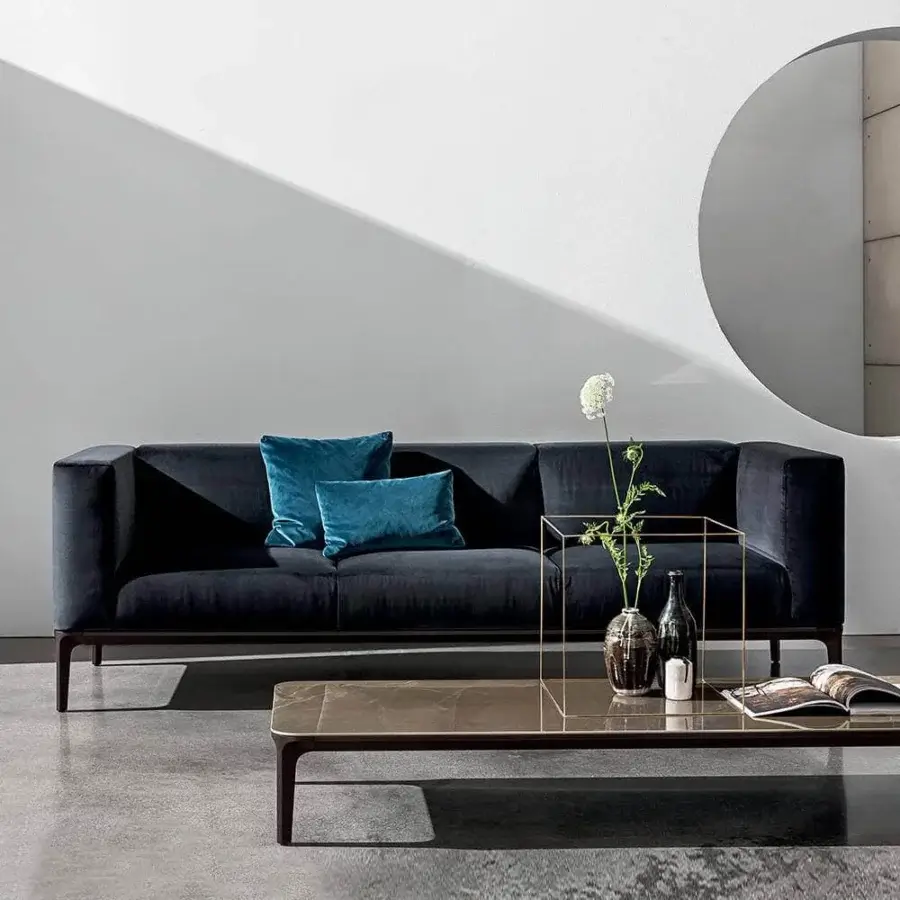 Lavish Sovet Italia Slim sofa with die-cast aluminum legs and plush dark navy or gray upholstery