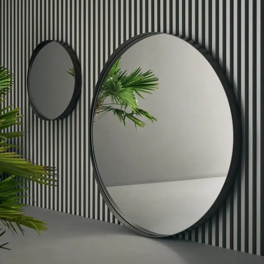 Exclusive Bonaldo Adone mirror, a floor-standing design with a slim dark metal frame and matte finish