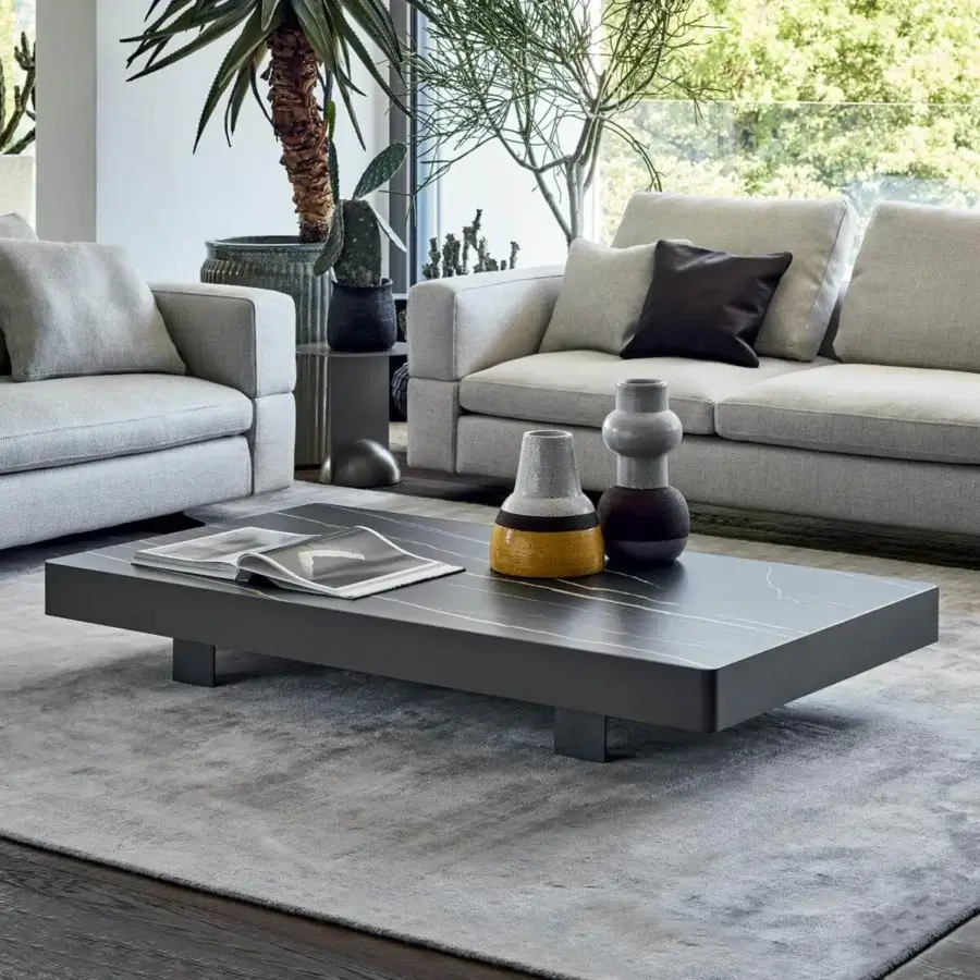 Sophisticated Bonaldo Jazz coffee table with dark marbled top and refined metal edge in matte finish