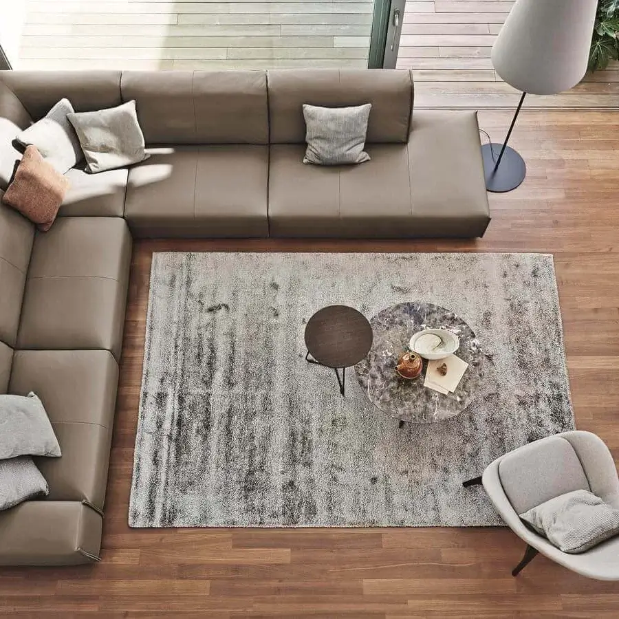 Elegant Ditre Italia Monolith sectional crafted with smooth light brown leather and varying gray-brown throw pillows