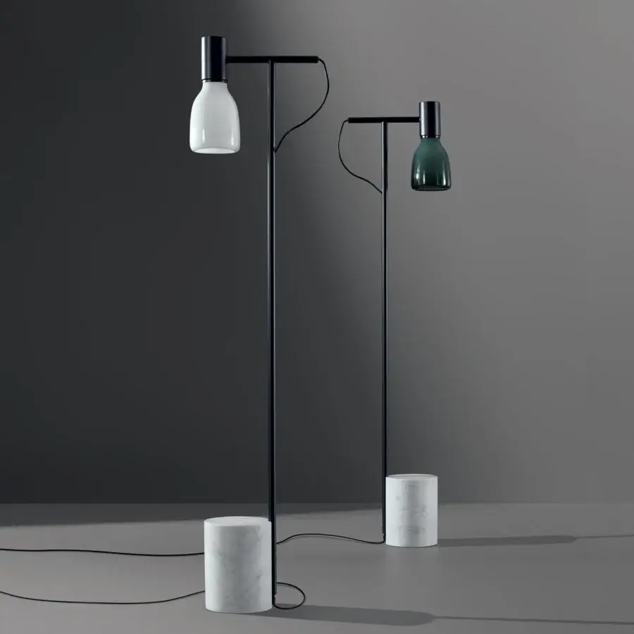 Captivating Bonaldo Acquerelli floor lamp with lead metal structure and hand-crafted dark green blown glass lampshade built with a cylindrical marble base