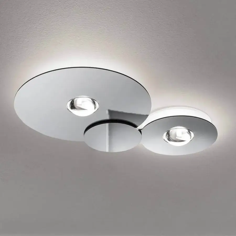 Distinguished Lodes Bugia ceiling lamp with interconnected reflective circular forms built in metal and a glossy chrome-like finish
