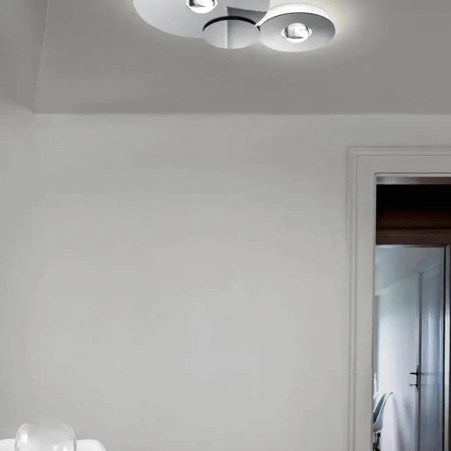 Elegant Lodes Bugia ceiling lamp with interconnected round shades crafted in polished chrome metal emitting balanced light