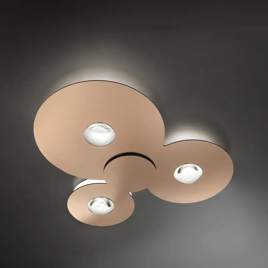 Distinctive Lodes Bugia ceiling lamp with interconnected circular elements crafted in metal with warm copper or bronze toned finish