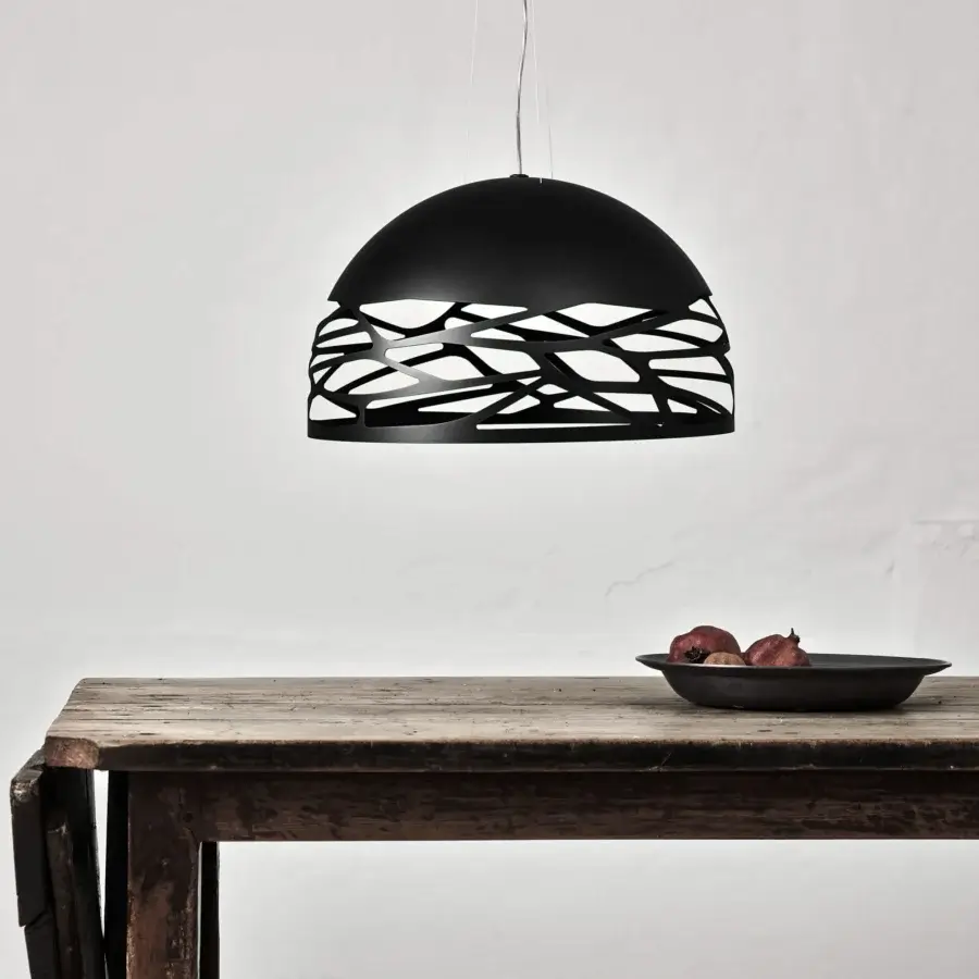 Elegant Lodes Kelly Dome suspension lamp with intricate laser-cut details in refined glossy white glass and sleek matt black metal
