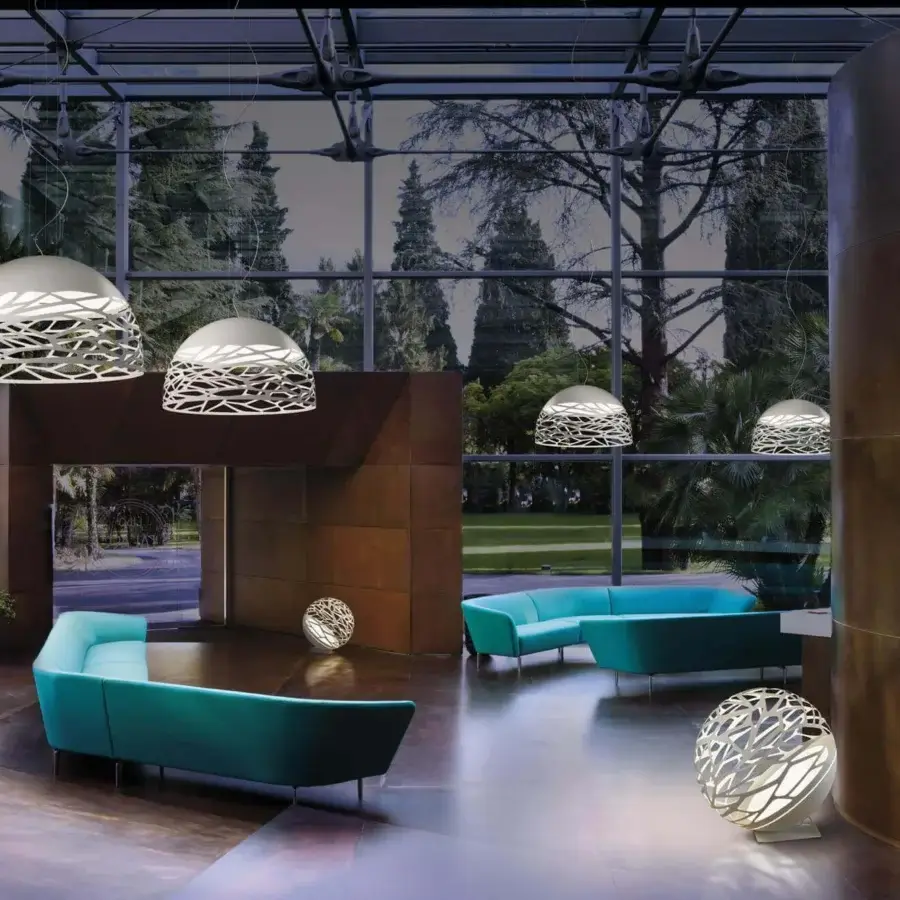 Distinguished Lodes Kelly Dome suspension lamp with a geometrically complex web pattern in glossy and matte white metal and glass