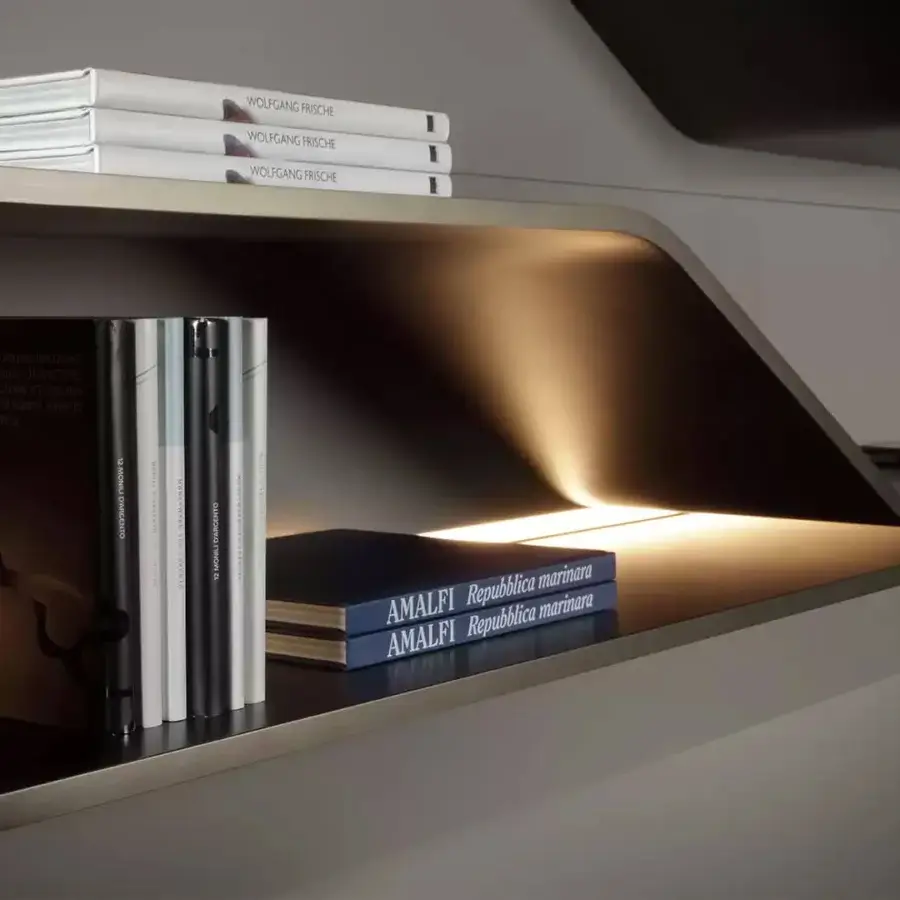 Elegant Reflex Segno shelf bookcase with a medium gray satin finish and interlocking wooden cantilevered shelving with integrated lighting