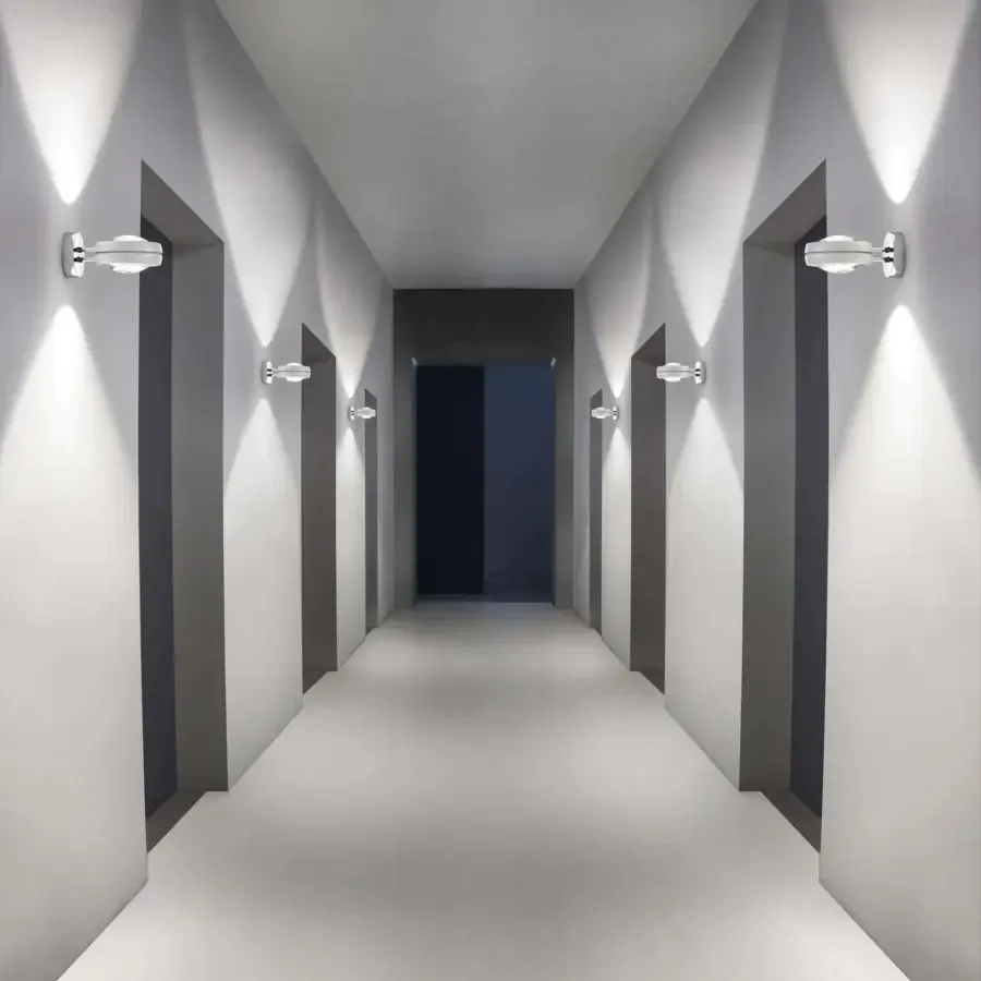 Exclusive Lodes Nautilus wall lamp crafted in Italy with a circular metal form and glossy white finish