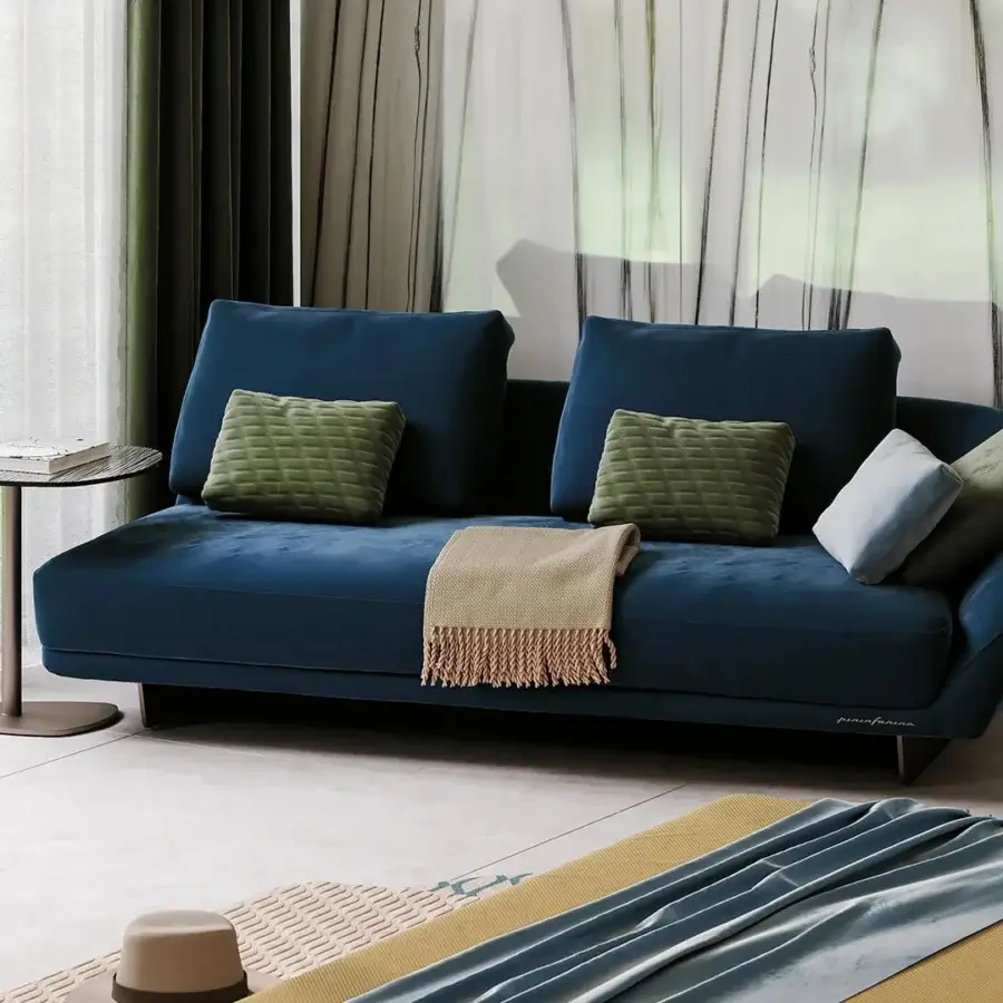 Exceptional Reflex Segno sofa handcrafted in Italy with matte blue textile, goose feather cushions and sleek metal legs