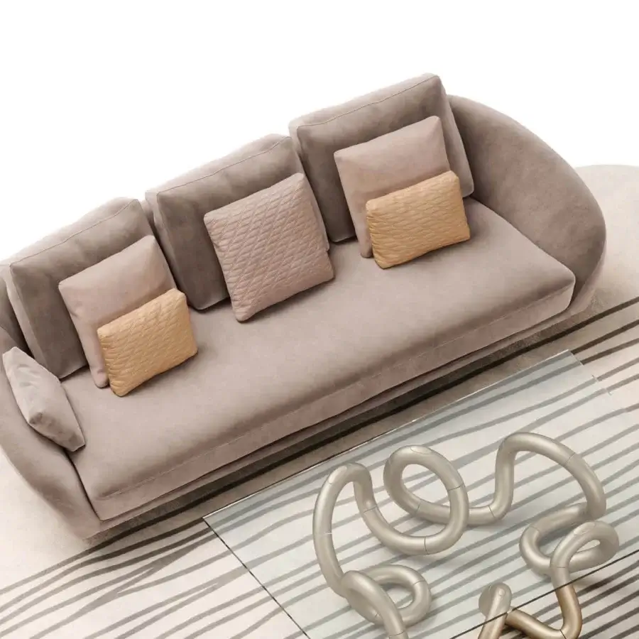 Elegant Reflex Segno sofa upholstered in smooth matte light beige fabric with metal legs and goose feather back cushions