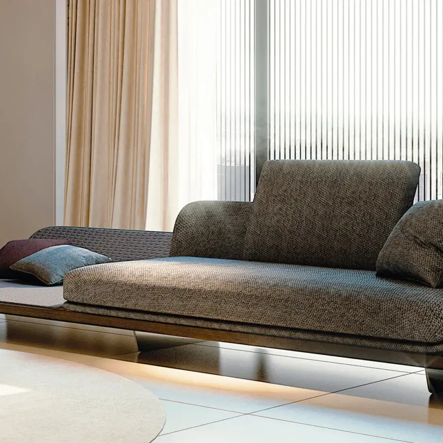 Lavish Reflex Segno sofa chaise lounge upholstered in grey-brown Segno quilted leather with a Canaletto Walnut platform and loose cushions