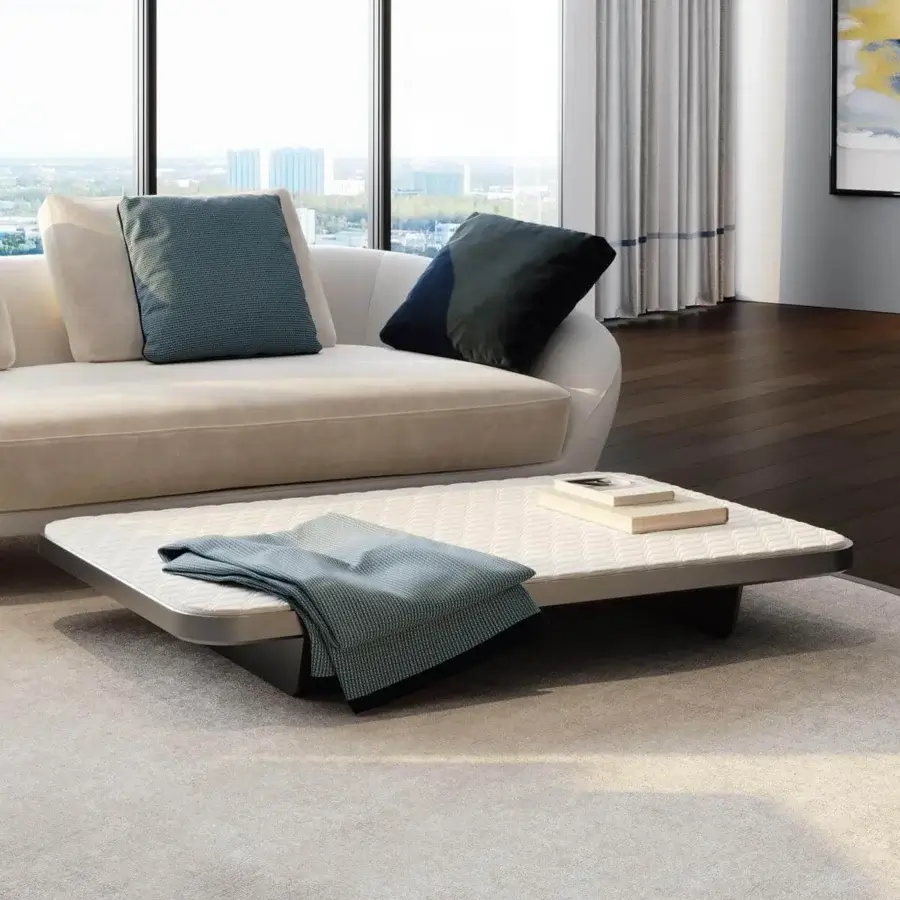 Exclusive Reflex Segno coffee table with solid wood top covered in refined leathers and quilted detail in a matte finish