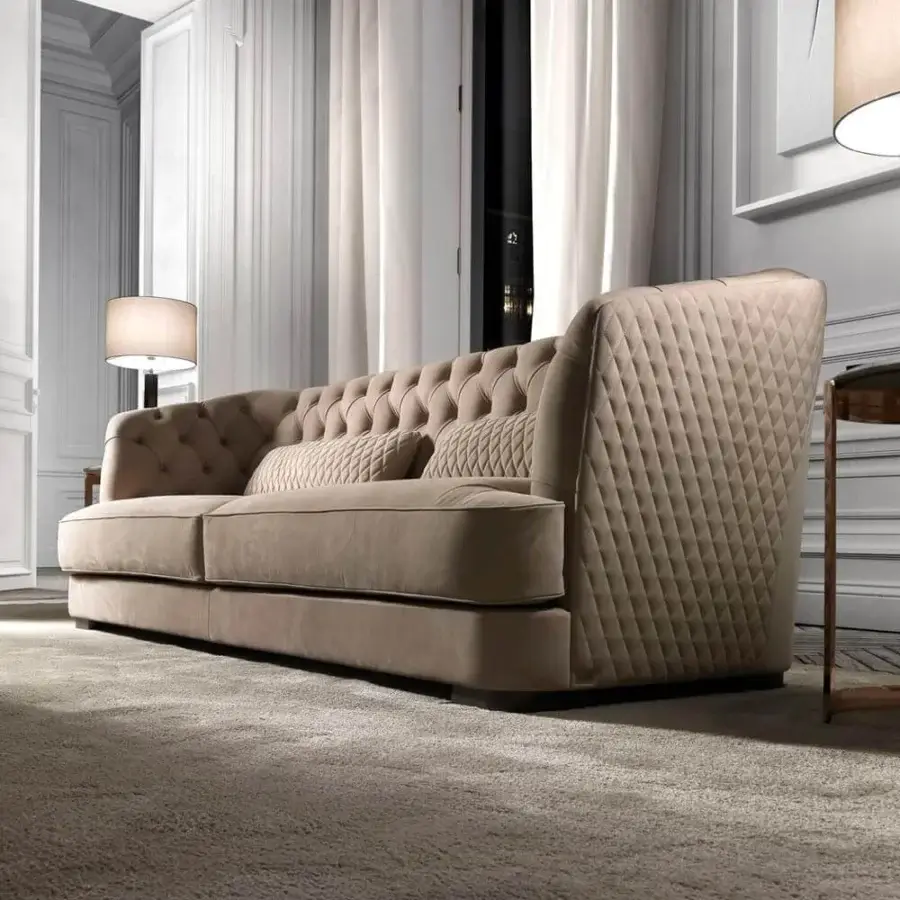 Distinguished DV Home Collection Vogue sofa with warm beige plush textile and matte finish, showcasing deep button tufting and diamond quilting