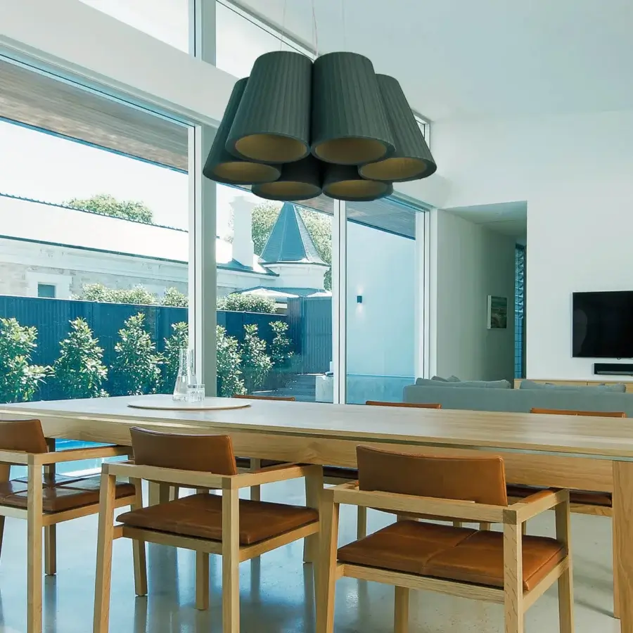 Distinguished Modo Luce Florinda suspension lamp with dark grey pleated textile shades lined in subtle gold interiors