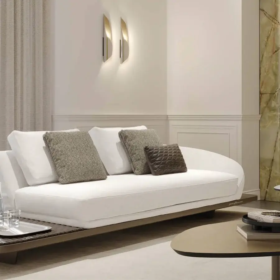 Refined Reflex Segno sofa with smooth white textile upholstery and Canaletto Walnut platform built with a matte finish