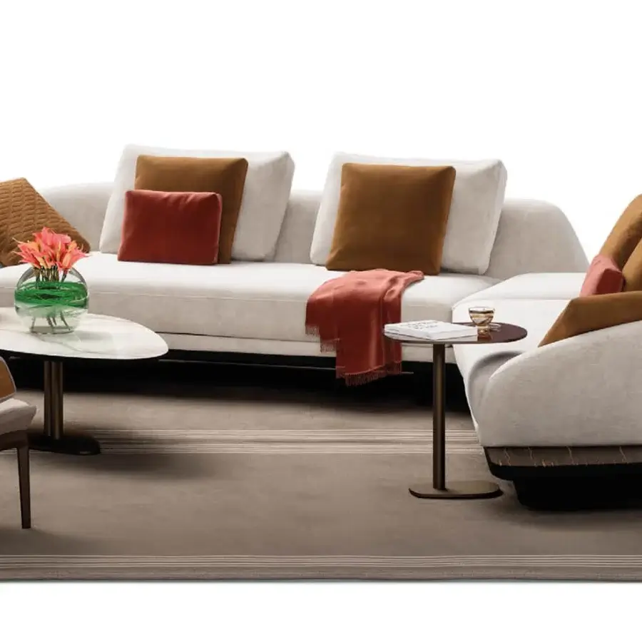 Distinguished Reflex Segno sofa with wooden structure, light beige upholstery and varying brown cushions atop a Canaletto Walnut platform