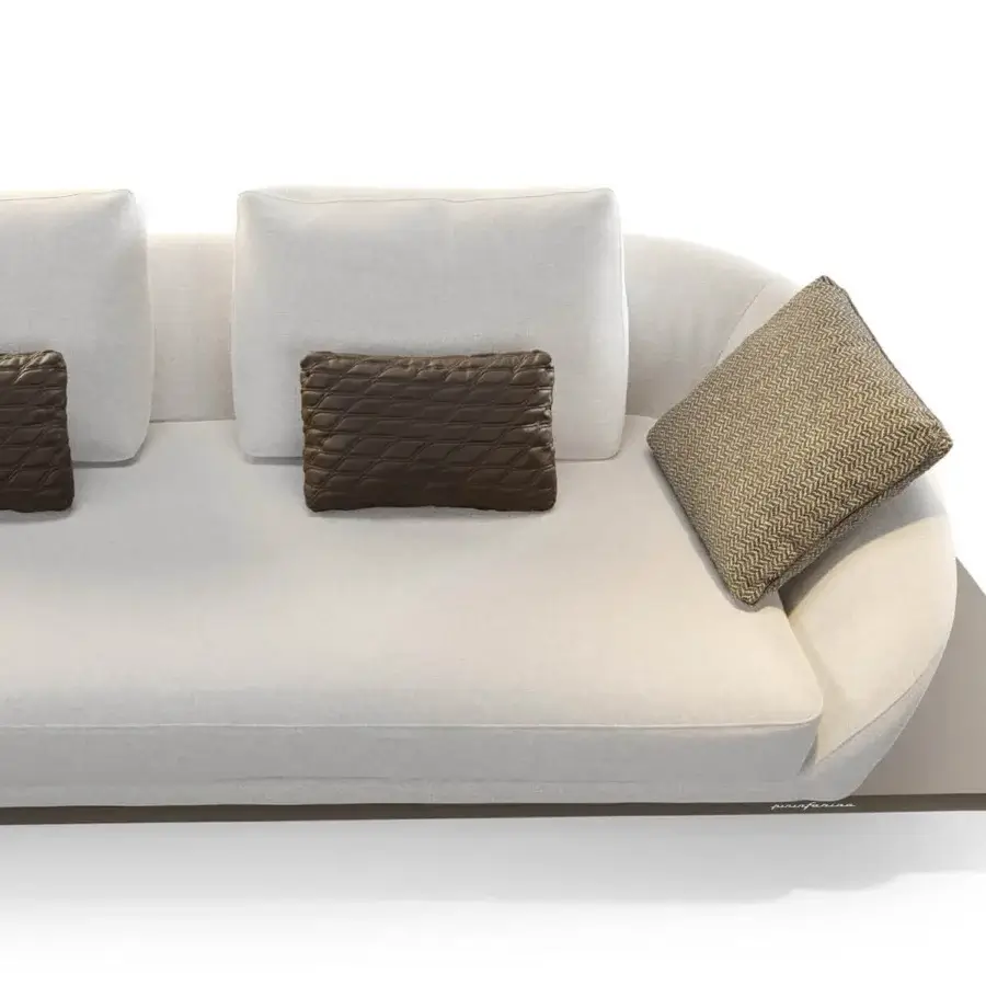 Superior Reflex Segno sofa with inviting curved silhouette, light textile upholstery and Canaletto Walnut platform with bronze metal legs