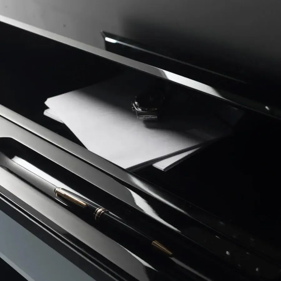 Avant-garde Reflex console crafted in shiny lacquered wood with bevelled lacquered glass fronts and a glossy black finish