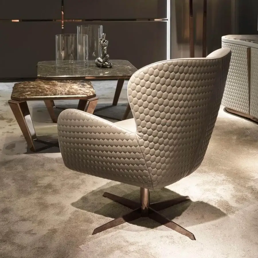 Distinctive DV Home Collection Elite lounge chair with refined beige fabric upholstery and hexagonal quilted finish