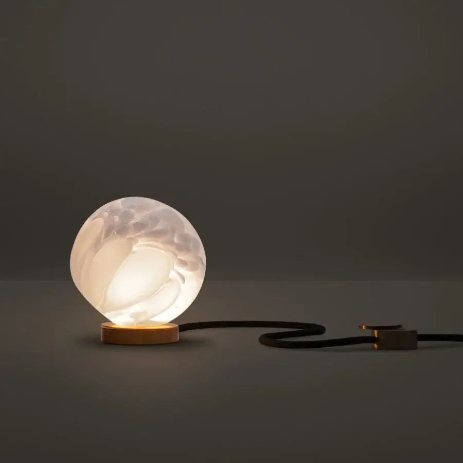 Exclusive Bocci 118 table lamp with hand-blown white opal glass shade and black fabric cord