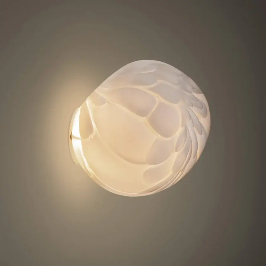 Superior Bocci 118 wall/ceiling lamp with dozens of feather-like forms in opal glass and a brass finish presenting a contemporary style