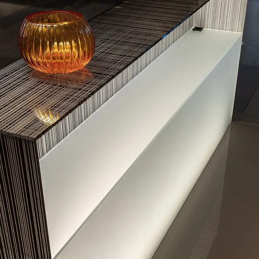 Avant-garde Reflex bar with glass counter, nero beluga lacquered platform, and white lacquered glass back