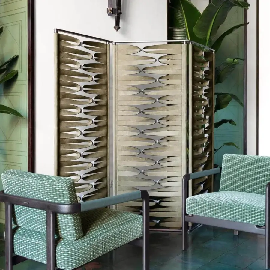 Distinguished Giorgetti Borealis room divider crafted in neutral beige leather with rotating aluminum panels and silver-toned metal framework
