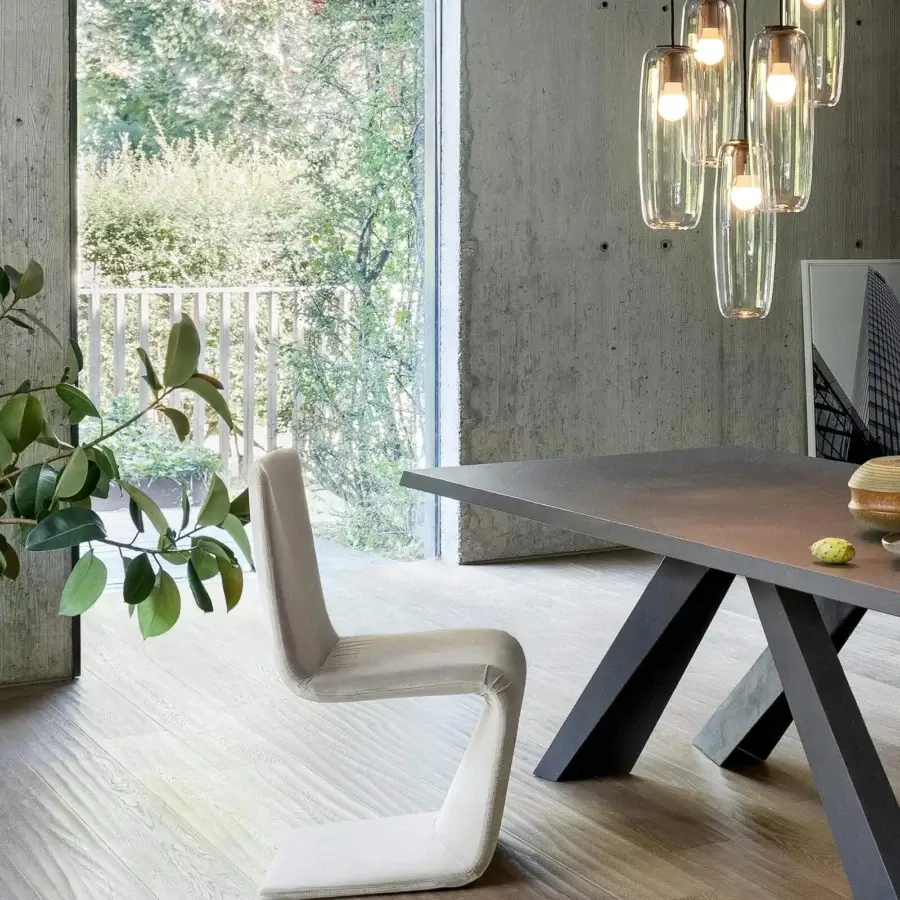Exceptional Bonaldo Venere chair with flowing lines and a matte finish in light beige textile upholstery