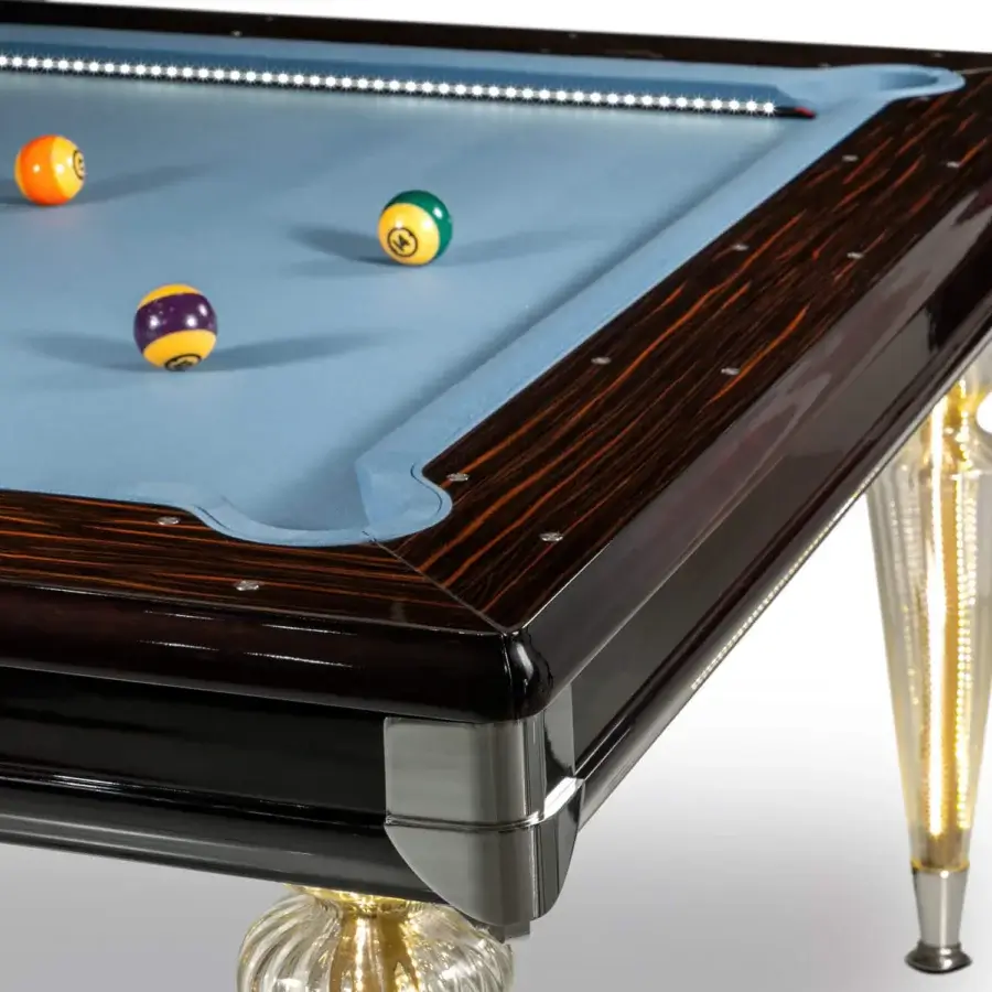 Superior Reflex Bill pool table with shiny lacquered wood, light blue playing-felt and illuminated Murano glass legs