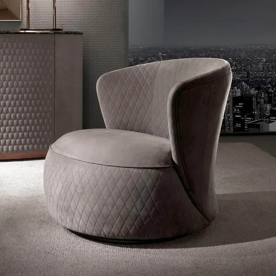 Distinguished DV Home Collection Soho lounge chair with muted gray-taupe textile and refined diamond quilting crafted in solid wood