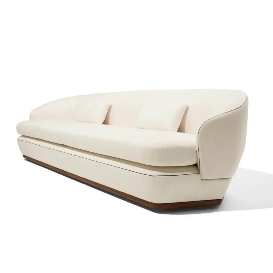 Sophisticated Giorgetti Tamino sofa with Canaletto walnut base and metal feet, upholstered in smooth matte textile with dark trim accents