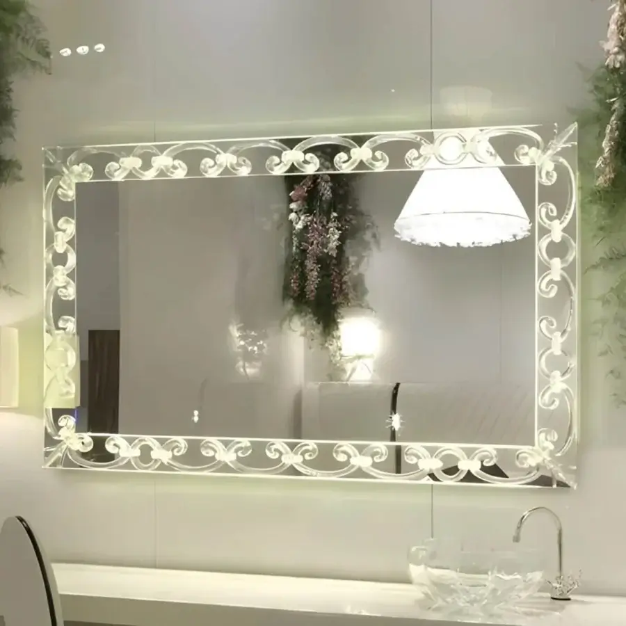 Distinguished Reflex Casanova mirror with extra clear glass encircled by ornate transparent Murano glass elements and integrated LED lighting