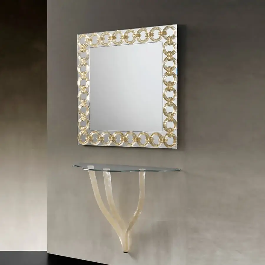 Lavish Reflex Casanova mirror crafted in Italy with interconnected clear Murano glass rings and delicate gold detailing
