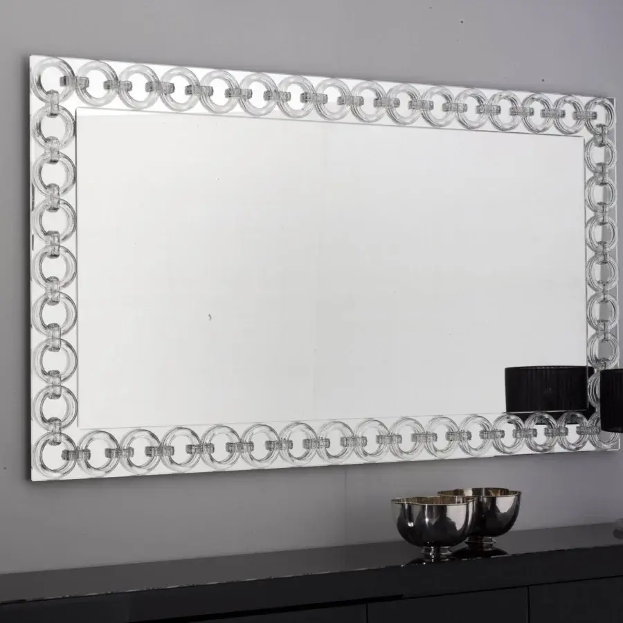 Exceptional Reflex Casanova mirror "O" is a rectangular glass mirror with transparent Murano glass rings crafted in Italy
